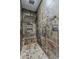 An elegant shower features stone tile, a rainfall showerhead, and a convenient built-in bench at 15217 N 15Th Dr, Phoenix, AZ 85023