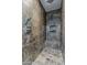 Walk in shower features natural stone tiling, built in shower caddy, and overhead shower head at 15217 N 15Th Dr, Phoenix, AZ 85023