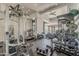 Fully equipped workout room featuring large windows and multiple weight training stations at 15217 N 15Th Dr, Phoenix, AZ 85023