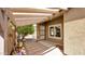 Rear covered patio with pavers provides a shady spot to relax and enjoy the outdoors at 17132 W Tara Ln, Surprise, AZ 85388