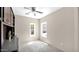 Well lit office featuring built-in storage and shelves, with a light grey carpet at 17132 W Tara Ln, Surprise, AZ 85388