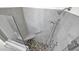 Walk-in shower featuring river rock floor and tile surround at 17132 W Tara Ln, Surprise, AZ 85388