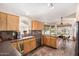 Functional kitchen boasting updated cabinetry, stainless steel appliances, and tiled flooring at 19029 N 36Th St, Phoenix, AZ 85050