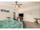 Large main bedroom featuring a ceiling fan, carpeted floors, and neutral wall paint at 19029 N 36Th St, Phoenix, AZ 85050