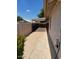 View of a concrete patio featuring stucco siding and a pergola at 19029 N 36Th St, Phoenix, AZ 85050