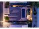 Aerial view showcases solar panels, a private pool, and mature landscaping on the property at 1932 S Arroyo Ln, Gilbert, AZ 85295