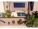 This aerial view highlights the refreshing backyard pool and solar panels on the home's roof at 1932 S Arroyo Ln, Gilbert, AZ 85295