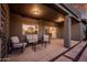Cozy outdoor living space with plush seating and views of the backyard and pool at 1932 S Arroyo Ln, Gilbert, AZ 85295