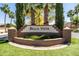 Bella Vista community entrance sign with meticulously maintained landscaping and lush green grass at 1932 S Arroyo Ln, Gilbert, AZ 85295