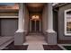 Inviting entryway with decorative columns and a secure front door at 1932 S Arroyo Ln, Gilbert, AZ 85295