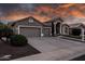 Charming single-story home featuring a 3-car garage and well-maintained landscaping at 1932 S Arroyo Ln, Gilbert, AZ 85295