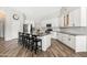 Bright and open kitchen with a large island, stainless steel appliances, and ample counter space at 1932 S Arroyo Ln, Gilbert, AZ 85295
