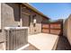 Back patio with access door and gate at 1932 S Arroyo Ln, Gilbert, AZ 85295