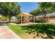 A shaded playground is conveniently located near walking paths and picnic areas in the neighborhood park at 1932 S Arroyo Ln, Gilbert, AZ 85295