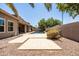 Landscaped backyard features a refreshing pool and ample space for outdoor activities at 1932 S Arroyo Ln, Gilbert, AZ 85295