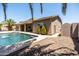 Backyard pool and patio area, perfect for outdoor entertaining and enjoying sunny days at 1932 S Arroyo Ln, Gilbert, AZ 85295