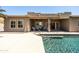 Backyard with pool, patio, and covered seating offers a relaxing outdoor experience at 1932 S Arroyo Ln, Gilbert, AZ 85295