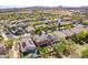 Aerial view of a desert home highlighting solar panels, private backyard with pool and well-manicured landscaping at 2210 W Calle Del Sol --, Phoenix, AZ 85085