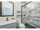 Bathroom showcasing a marble shower, modern fixtures, and ample counter space at 2210 W Calle Del Sol --, Phoenix, AZ 85085