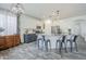 Bright, modern kitchen with white cabinets, stainless steel appliances, and a large center island at 2210 W Calle Del Sol --, Phoenix, AZ 85085