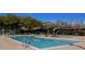 Relaxing community pool with lounge chairs for residents to enjoy in a resort-style setting at 2210 W Calle Del Sol --, Phoenix, AZ 85085
