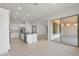 A spacious kitchen flows into an open floor plan with a large sliding glass door at 22528 E San Tan Blvd, Queen Creek, AZ 85142