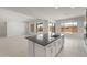 Open-concept kitchen showcases the island, countertops, and cabinetry at 22528 E San Tan Blvd, Queen Creek, AZ 85142