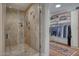 Spa-like bathroom features a glass-enclosed shower and a walk-in closet at 2402 E Esplanade Ln # 1101, Phoenix, AZ 85016