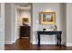 Stylish hallway featuring elegant decor, hardwood floors, and a curated art collection at 2402 E Esplanade Ln # 1101, Phoenix, AZ 85016