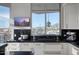 Modern kitchen with stunning views, sleek countertops, and high-end appliances at 2402 E Esplanade Ln # 1101, Phoenix, AZ 85016