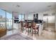 Open kitchen featuring a large island, modern appliances, and a breakfast bar area at 2402 E Esplanade Ln # 1101, Phoenix, AZ 85016