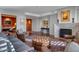 Elegant living room with a fireplace, stylish seating, and a decorative rug at 2402 E Esplanade Ln # 1101, Phoenix, AZ 85016
