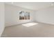 Bedroom with neutral carpeting, large window and recessed lighting at 26160 S 225Th Way, Queen Creek, AZ 85142