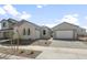 Charming single-story stucco home with a two-car garage and tiled roof at 26160 S 225Th Way, Queen Creek, AZ 85142