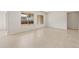 Bright open-concept living area with tile floors and large sunny windows at 26160 S 225Th Way, Queen Creek, AZ 85142