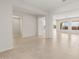 Open-concept living space with tile floors, modern columns and abundant natural light at 26160 S 225Th Way, Queen Creek, AZ 85142
