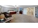Large bedroom featuring a ceiling fan, a sitting area and television at 30185 W Flower St, Buckeye, AZ 85396