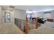 Open loft area with view of pool table, perfect for entertaining and relaxation at 30185 W Flower St, Buckeye, AZ 85396