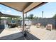 Spacious backyard patio with seating, grill, and storage shed at 3237 S Albert Ave, Tempe, AZ 85282