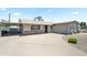Single-story home boasts a covered parking space, low-maintenance desert landscape, and an attached one-car garage at 3237 S Albert Ave, Tempe, AZ 85282