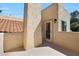 Balcony with stucco walls and a door leading inside, showcasing outdoor living at 3441 N 31St St # 118, Phoenix, AZ 85016