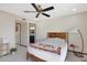 Bedroom with natural light, a ceiling fan, and a lamp at 3441 N 31St St # 118, Phoenix, AZ 85016