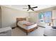 Bedroom with natural light, a ceiling fan, and a view to the outside at 3441 N 31St St # 118, Phoenix, AZ 85016