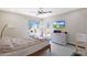 Bedroom with natural light, a ceiling fan, and a mounted flat screen television at 3441 N 31St St # 118, Phoenix, AZ 85016