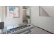 Neutral room with a keyboard on a glass desk and light entering from the window at 3441 N 31St St # 118, Phoenix, AZ 85016