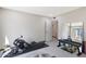 Home gym including a rowing machine, weights, mirrors and easy access from the back door at 3441 N 31St St # 118, Phoenix, AZ 85016