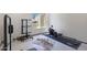 Home gym featuring various exercise equipment and natural light from the open window at 3441 N 31St St # 118, Phoenix, AZ 85016