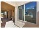 Charming gated patio with a table and chairs providing a welcoming entry and view of the landscape at 3441 N 31St St # 118, Phoenix, AZ 85016