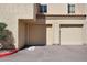 Image of a home's garages and covered parking with desert landscape and rock details at 3441 N 31St St # 118, Phoenix, AZ 85016