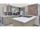 Modern kitchen boasts custom cabinetry, quartz countertops, stainless appliances, and colorful mosaic tiling at 3441 N 31St St # 118, Phoenix, AZ 85016
